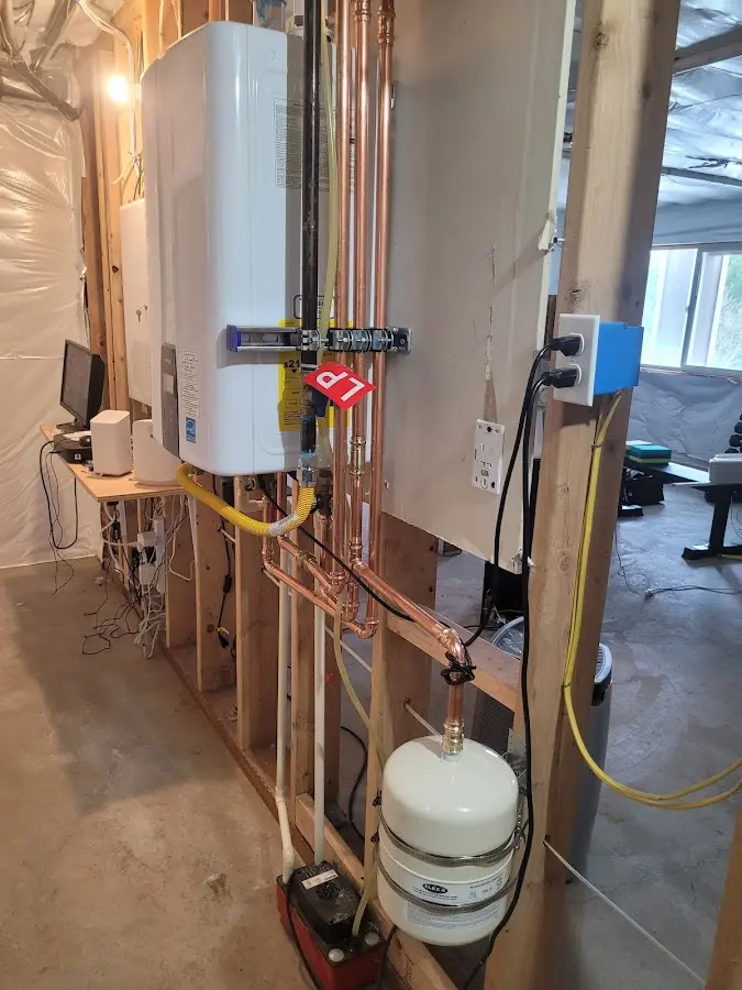 Licensed plumber repairing a kitchen sink in Guymon